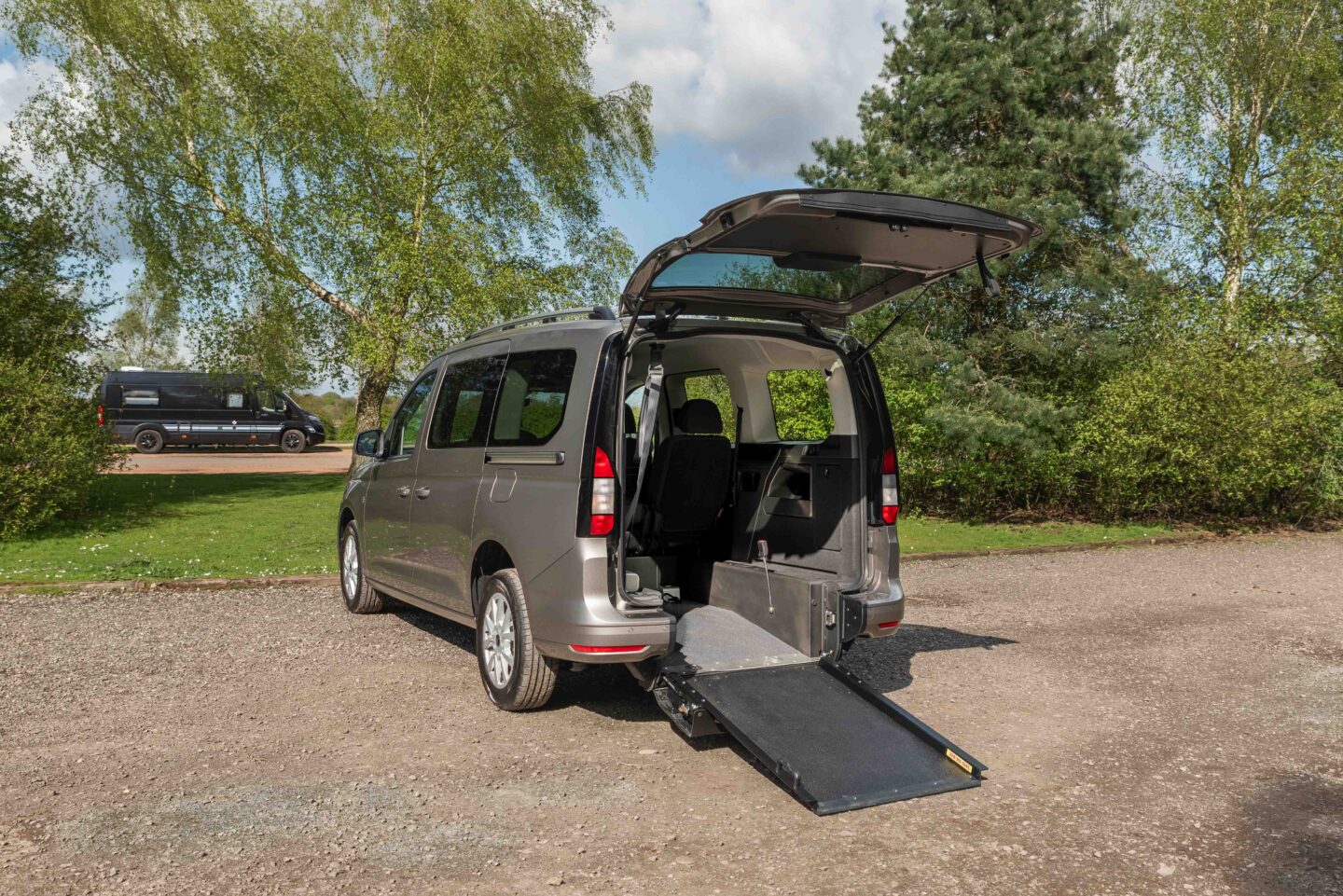 Dusky silver: Ford Connect - Rear Wheelchair Passenger open boot with ramp